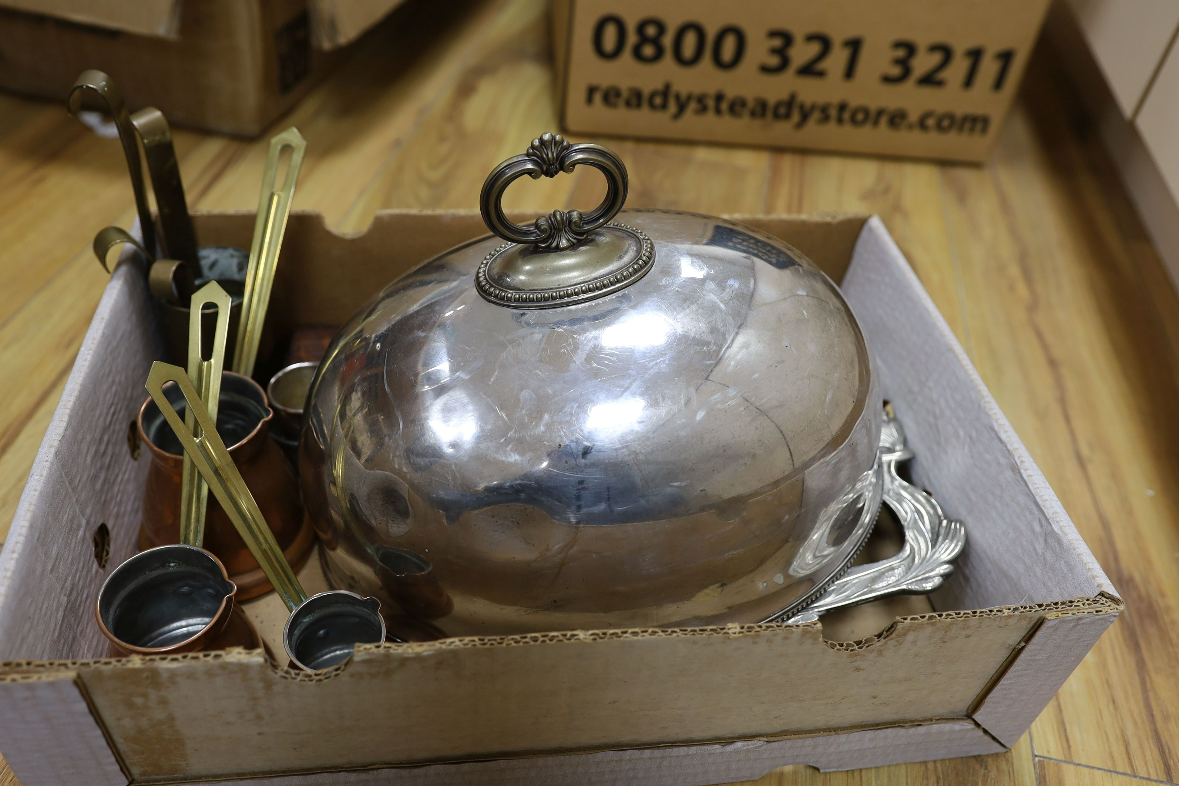 A silver plated meat dome, brass and copper measures, ship in a bottle, mixed collectables